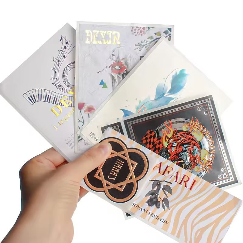 Custom Private Design Waterproof High Glossy Varnish Gold Foil Embossed Printing Paper Stickers Label For Whisky Liquor Bottle